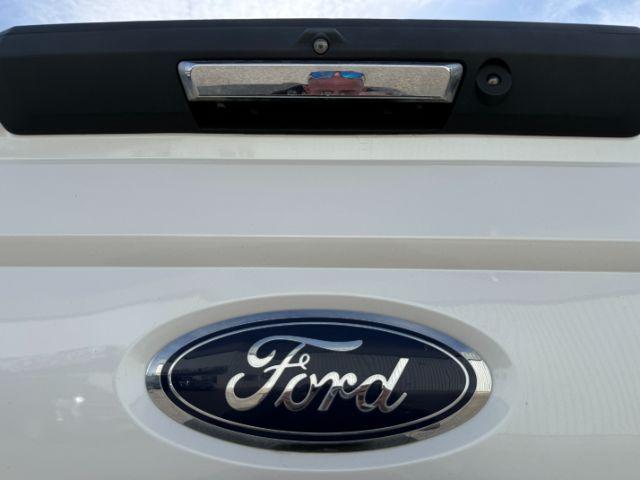 2019 WHITE /Black Ford F-250 LARIAT (1FT7W2BT2KE) with an Powerstroke 6.7L V-8 diesel direct injection engine, AUTOMATIC transmission, located at 1235 N Woodruff Ave., Idaho Falls, 83401, (208) 523-1053, 43.507172, -112.000488 - Clean, confident, and built with purpose, this 2019 Ford F-250 Super Duty brings serious diesel strength with its 6.7L Power Stroke under the hood, ready for demanding towing and heavy hauling. The bed cover adds secure, weather-protected storage that keeps gear and tools locked down and organized,- Photo#32