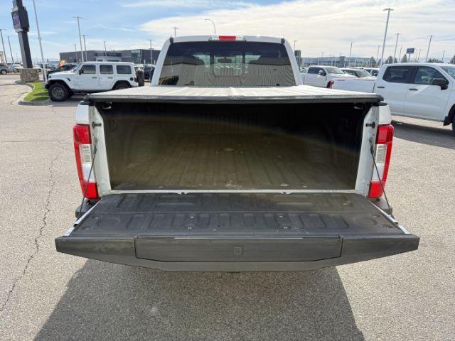 2019 WHITE /Black Ford F-250 LARIAT (1FT7W2BT2KE) with an Powerstroke 6.7L V-8 diesel direct injection engine, AUTOMATIC transmission, located at 1235 N Woodruff Ave., Idaho Falls, 83401, (208) 523-1053, 43.507172, -112.000488 - Clean, confident, and built with purpose, this 2019 Ford F-250 Super Duty brings serious diesel strength with its 6.7L Power Stroke under the hood, ready for demanding towing and heavy hauling. The bed cover adds secure, weather-protected storage that keeps gear and tools locked down and organized,- Photo#33