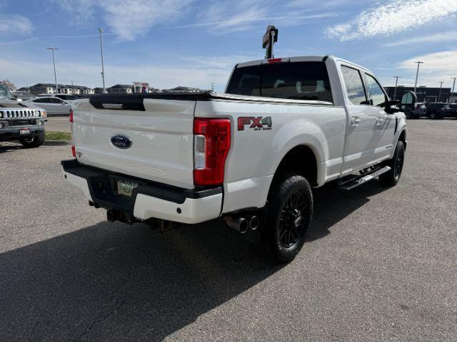 2019 WHITE /Black Ford F-250 LARIAT (1FT7W2BT2KE) with an Powerstroke 6.7L V-8 diesel direct injection engine, AUTOMATIC transmission, located at 1235 N Woodruff Ave., Idaho Falls, 83401, (208) 523-1053, 43.507172, -112.000488 - Clean, confident, and built with purpose, this 2019 Ford F-250 Super Duty brings serious diesel strength with its 6.7L Power Stroke under the hood, ready for demanding towing and heavy hauling. The bed cover adds secure, weather-protected storage that keeps gear and tools locked down and organized,- Photo#34
