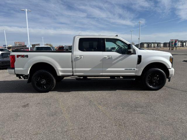 2019 WHITE /Black Ford F-250 LARIAT (1FT7W2BT2KE) with an Powerstroke 6.7L V-8 diesel direct injection engine, AUTOMATIC transmission, located at 1235 N Woodruff Ave., Idaho Falls, 83401, (208) 523-1053, 43.507172, -112.000488 - Clean, confident, and built with purpose, this 2019 Ford F-250 Super Duty brings serious diesel strength with its 6.7L Power Stroke under the hood, ready for demanding towing and heavy hauling. The bed cover adds secure, weather-protected storage that keeps gear and tools locked down and organized,- Photo#35