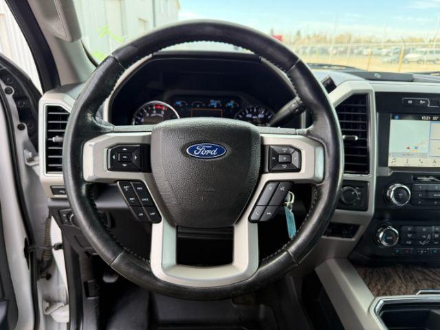 2019 WHITE /Black Ford F-250 LARIAT (1FT7W2BT2KE) with an Powerstroke 6.7L V-8 diesel direct injection engine, AUTOMATIC transmission, located at 1235 N Woodruff Ave., Idaho Falls, 83401, (208) 523-1053, 43.507172, -112.000488 - Clean, confident, and built with purpose, this 2019 Ford F-250 Super Duty brings serious diesel strength with its 6.7L Power Stroke under the hood, ready for demanding towing and heavy hauling. The bed cover adds secure, weather-protected storage that keeps gear and tools locked down and organized,- Photo#43