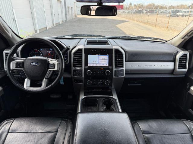 2019 WHITE /Black Ford F-250 LARIAT (1FT7W2BT2KE) with an Powerstroke 6.7L V-8 diesel direct injection engine, AUTOMATIC transmission, located at 1235 N Woodruff Ave., Idaho Falls, 83401, (208) 523-1053, 43.507172, -112.000488 - Clean, confident, and built with purpose, this 2019 Ford F-250 Super Duty brings serious diesel strength with its 6.7L Power Stroke under the hood, ready for demanding towing and heavy hauling. The bed cover adds secure, weather-protected storage that keeps gear and tools locked down and organized,- Photo#52