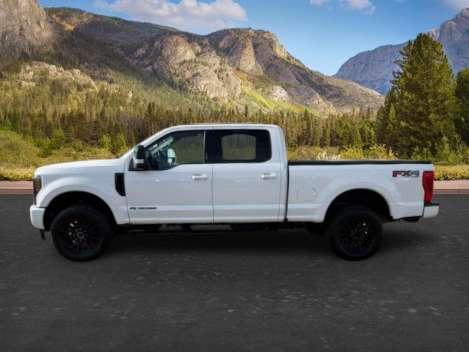 2019 WHITE /Black Ford F-250 LARIAT (1FT7W2BT2KE) with an Powerstroke 6.7L V-8 diesel direct injection engine, AUTOMATIC transmission, located at 1235 N Woodruff Ave., Idaho Falls, 83401, (208) 523-1053, 43.507172, -112.000488 - Clean, confident, and built with purpose, this 2019 Ford F-250 Super Duty brings serious diesel strength with its 6.7L Power Stroke under the hood, ready for demanding towing and heavy hauling. The bed cover adds secure, weather-protected storage that keeps gear and tools locked down and organized,- Photo#1