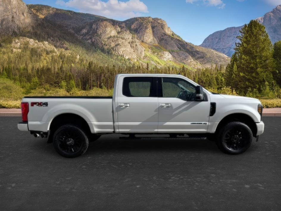 2019 WHITE /Black Ford F-250 LARIAT (1FT7W2BT2KE) with an Powerstroke 6.7L V-8 diesel direct injection engine, AUTOMATIC transmission, located at 1235 N Woodruff Ave., Idaho Falls, 83401, (208) 523-1053, 43.507172, -112.000488 - Clean, confident, and built with purpose, this 2019 Ford F-250 Super Duty brings serious diesel strength with its 6.7L Power Stroke under the hood, ready for demanding towing and heavy hauling. The bed cover adds secure, weather-protected storage that keeps gear and tools locked down and organized,- Photo#7