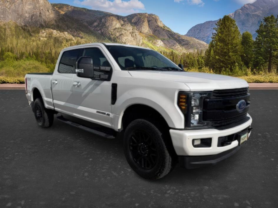 2019 WHITE /Black Ford F-250 LARIAT (1FT7W2BT2KE) with an Powerstroke 6.7L V-8 diesel direct injection engine, AUTOMATIC transmission, located at 1235 N Woodruff Ave., Idaho Falls, 83401, (208) 523-1053, 43.507172, -112.000488 - Clean, confident, and built with purpose, this 2019 Ford F-250 Super Duty brings serious diesel strength with its 6.7L Power Stroke under the hood, ready for demanding towing and heavy hauling. The bed cover adds secure, weather-protected storage that keeps gear and tools locked down and organized,- Photo#8