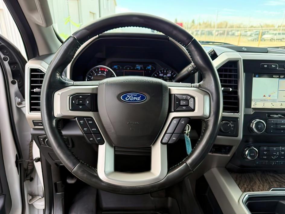 2019 WHITE /Black Ford F-250 LARIAT (1FT7W2BT2KE) with an Powerstroke 6.7L V-8 diesel direct injection engine, AUTOMATIC transmission, located at 1235 N Woodruff Ave., Idaho Falls, 83401, (208) 523-1053, 43.507172, -112.000488 - Clean, confident, and built with purpose, this 2019 Ford F-250 Super Duty brings serious diesel strength with its 6.7L Power Stroke under the hood, ready for demanding towing and heavy hauling. The bed cover adds secure, weather-protected storage that keeps gear and tools locked down and organized,- Photo#15