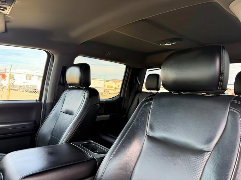 2019 WHITE /Black Ford F-250 LARIAT (1FT7W2BT2KE) with an Powerstroke 6.7L V-8 diesel direct injection engine, AUTOMATIC transmission, located at 1235 N Woodruff Ave., Idaho Falls, 83401, (208) 523-1053, 43.507172, -112.000488 - Clean, confident, and built with purpose, this 2019 Ford F-250 Super Duty brings serious diesel strength with its 6.7L Power Stroke under the hood, ready for demanding towing and heavy hauling. The bed cover adds secure, weather-protected storage that keeps gear and tools locked down and organized,- Photo#22