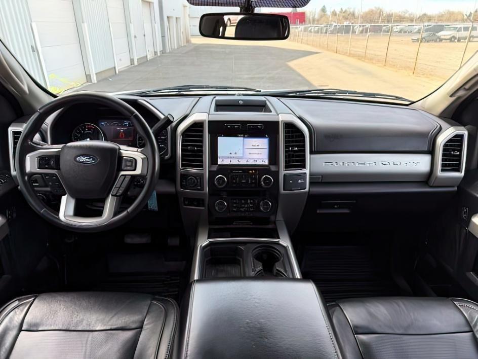 2019 WHITE /Black Ford F-250 LARIAT (1FT7W2BT2KE) with an Powerstroke 6.7L V-8 diesel direct injection engine, AUTOMATIC transmission, located at 1235 N Woodruff Ave., Idaho Falls, 83401, (208) 523-1053, 43.507172, -112.000488 - Clean, confident, and built with purpose, this 2019 Ford F-250 Super Duty brings serious diesel strength with its 6.7L Power Stroke under the hood, ready for demanding towing and heavy hauling. The bed cover adds secure, weather-protected storage that keeps gear and tools locked down and organized,- Photo#24