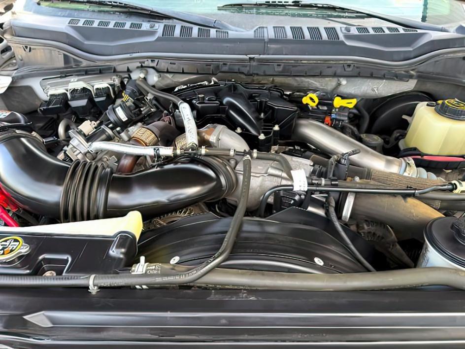 2019 WHITE /Black Ford F-250 LARIAT (1FT7W2BT2KE) with an Powerstroke 6.7L V-8 diesel direct injection engine, AUTOMATIC transmission, located at 1235 N Woodruff Ave., Idaho Falls, 83401, (208) 523-1053, 43.507172, -112.000488 - Clean, confident, and built with purpose, this 2019 Ford F-250 Super Duty brings serious diesel strength with its 6.7L Power Stroke under the hood, ready for demanding towing and heavy hauling. The bed cover adds secure, weather-protected storage that keeps gear and tools locked down and organized,- Photo#27