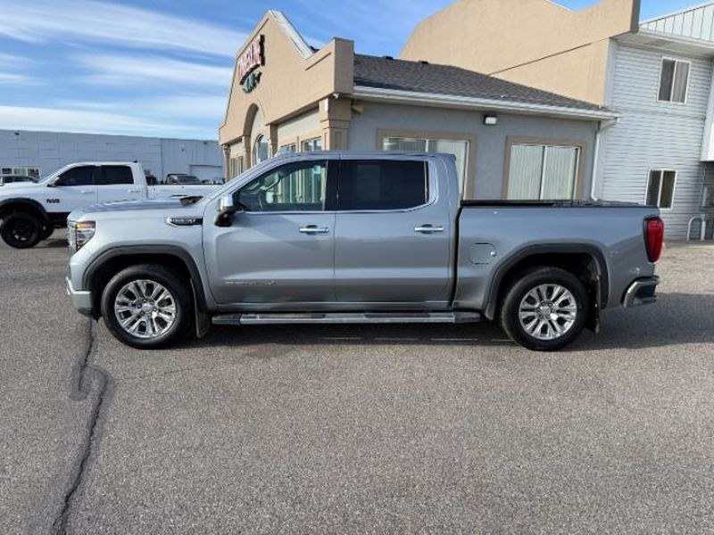 2023 Titanium Rush Metallic /Jet Black GMC Sierra Denali (1GTUUGED0PZ) with an V8, 5.3L engine, 10-speed automatic transmission, located at 1175 N Woodruff Ave, Idaho Falls, ID, 83401, 43.506901, -111.999657 - <b>Vehicle Details</b><br>Discover this pre-owned 2023 GMC Sierra 1500 Denali, a premium pickup that blends luxury comfort and proven capability. Powered by a V8, 5.3L Gasoline engine and equipped with 4WD, this GMC Sierra is built to handle Idaho roads, towing, and daily driving with confidence. In- Photo#1