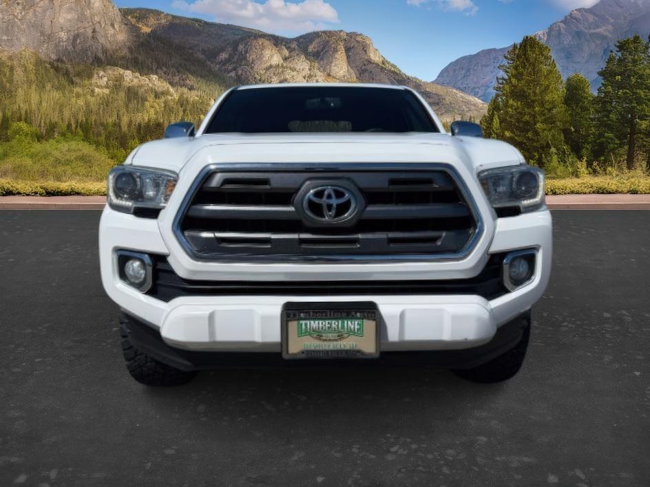 2016 Super White /Hickory Toyota Tacoma (5TFHZ5BN0GX) with an 35L V-6 portdirect injection engine, Automatic transmission, located at 1175 N Woodruff Ave, Idaho Falls, ID, 83401, 43.506901, -111.999657 - At Timberline Auto, finding a great deal on your next vehicle is always easy! Our experienced sales staff's goal is to help find you the right vehicle at the right price! Our knowledgeable finance department has options for almost any credit score. We offer extended service contract options to prote- Photo#9