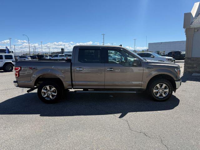2019 GRAY /Black Ford F-150 (1FTEW1E43KK) with an EcoBoost 35L V-6 portdirect injection engine, Automatic transmission, located at 1175 N Woodruff Ave, Idaho Falls, ID, 83401, 43.506901, -111.999657 - Interior flexibility and full size truck practicality come together in this 2019 Ford F-150 SuperCrew 4x4, giving drivers a setup that works well for both daily use and truck duties. Equipped with a foldable front bench seat configuration, the cabin can adapt for added seating capacity or create add- Photo#33