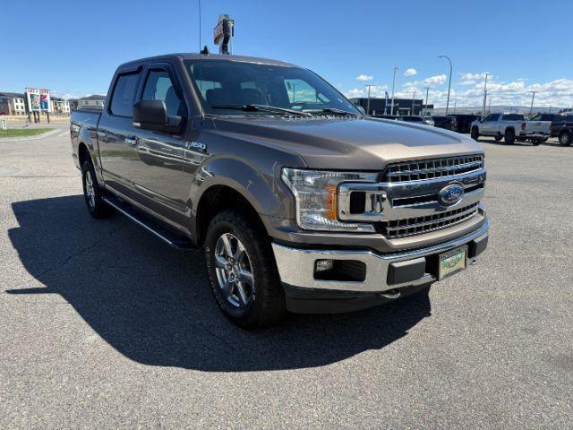 2019 GRAY /Black Ford F-150 (1FTEW1E43KK) with an EcoBoost 35L V-6 portdirect injection engine, Automatic transmission, located at 1175 N Woodruff Ave, Idaho Falls, ID, 83401, 43.506901, -111.999657 - Interior flexibility and full size truck practicality come together in this 2019 Ford F-150 SuperCrew 4x4, giving drivers a setup that works well for both daily use and truck duties. Equipped with a foldable front bench seat configuration, the cabin can adapt for added seating capacity or create add- Photo#34