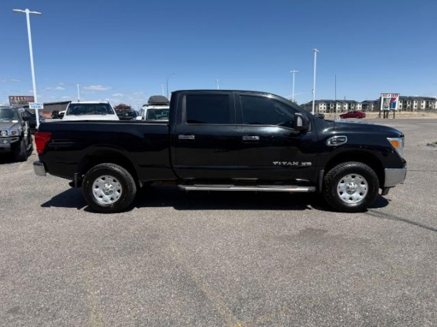 2016 GRAY /Black Nissan TITAN XD SV Diesel (1N6BA1F32GN) with an 5L V-8 diesel direct injection engine, AUTOMATIC transmission, located at 1235 N Woodruff Ave., Idaho Falls, 83401, (208) 523-1053, 43.507172, -112.000488 - At Timberline Auto, finding a great deal on your next vehicle is always easy! Our experienced sales staff's goal is to help find you the right vehicle at the right price! Our knowledgeable finance department has options for almost any credit score. We offer extended service contract options to prote - Photo#33
