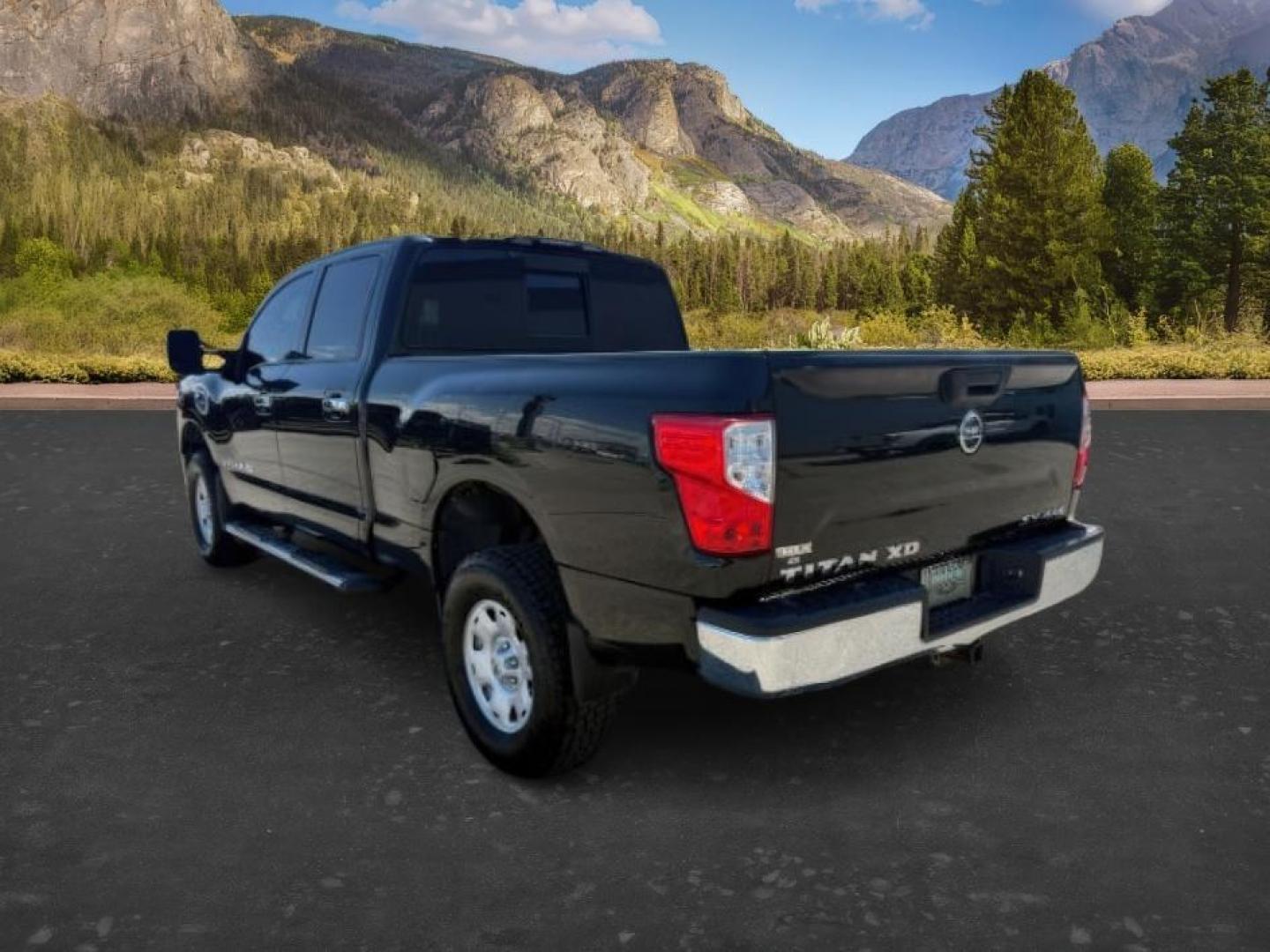 2016 GRAY /Black Nissan TITAN XD SV Diesel (1N6BA1F32GN) with an 5L V-8 diesel direct injection engine, AUTOMATIC transmission, located at 1235 N Woodruff Ave., Idaho Falls, 83401, (208) 523-1053, 43.507172, -112.000488 - At Timberline Auto, finding a great deal on your next vehicle is always easy! Our experienced sales staff's goal is to help find you the right vehicle at the right price! Our knowledgeable finance department has options for almost any credit score. We offer extended service contract options to prote - Photo#2