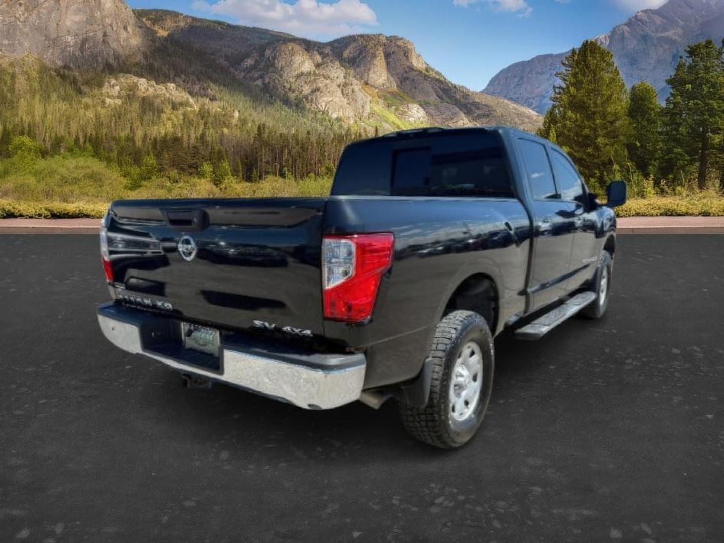 2016 GRAY /Black Nissan TITAN XD SV Diesel (1N6BA1F32GN) with an 5L V-8 diesel direct injection engine, AUTOMATIC transmission, located at 1235 N Woodruff Ave., Idaho Falls, 83401, (208) 523-1053, 43.507172, -112.000488 - At Timberline Auto, finding a great deal on your next vehicle is always easy! Our experienced sales staff's goal is to help find you the right vehicle at the right price! Our knowledgeable finance department has options for almost any credit score. We offer extended service contract options to prote - Photo#5