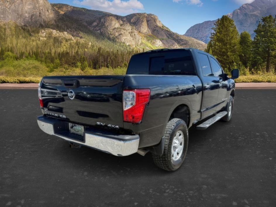 2016 GRAY /Black Nissan TITAN XD SV Diesel (1N6BA1F32GN) with an 5L V-8 diesel direct injection engine, AUTOMATIC transmission, located at 1235 N Woodruff Ave., Idaho Falls, 83401, (208) 523-1053, 43.507172, -112.000488 - Daily truck practicality and heavy duty functionality come together in this 2016 Nissan Titan XD Crew Cab 4x4, combining full size pickup utility with the added strength of the XD platform. Equipped with a 5.0L Cummins turbo diesel V8 and four wheel drive capability, this truck offers diesel power p- Photo#5