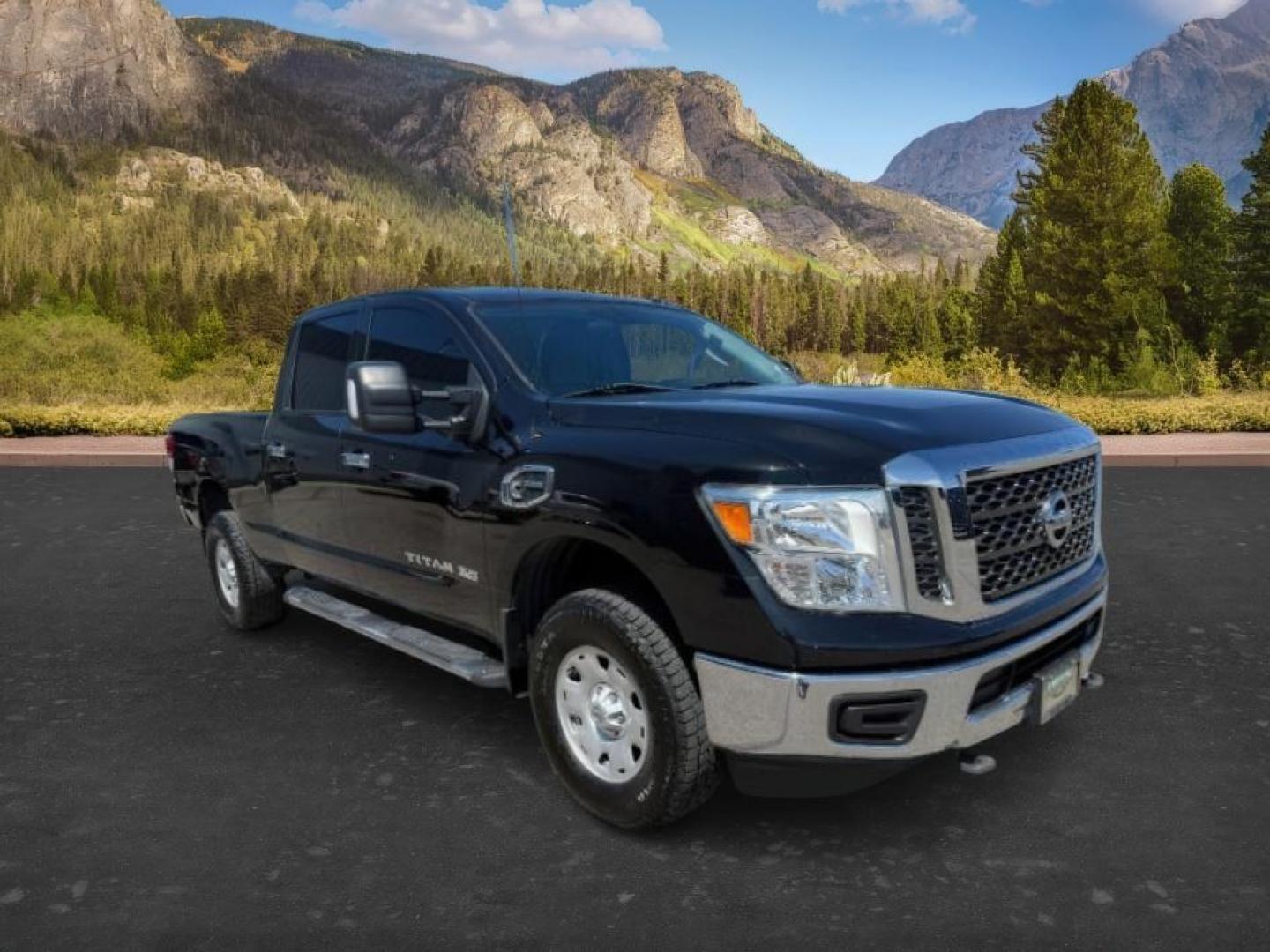 2016 GRAY /Black Nissan TITAN XD SV Diesel (1N6BA1F32GN) with an 5L V-8 diesel direct injection engine, AUTOMATIC transmission, located at 1235 N Woodruff Ave., Idaho Falls, 83401, (208) 523-1053, 43.507172, -112.000488 - At Timberline Auto, finding a great deal on your next vehicle is always easy! Our experienced sales staff's goal is to help find you the right vehicle at the right price! Our knowledgeable finance department has options for almost any credit score. We offer extended service contract options to prote - Photo#7