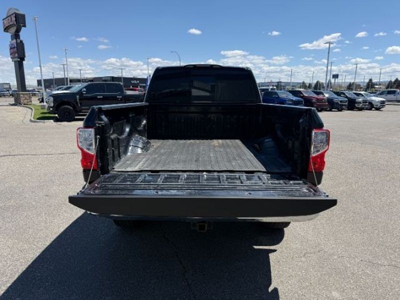 2016 Magnetic Black /Beige Nissan Titan XD SV (1N6BA1F32GN) with an V8, 5.0L engine, 6-speed automatic transmission, located at 1175 N Woodruff Ave, Idaho Falls, ID, 83401, 43.506901, -111.999657 - <b>Vehicle Details</b><br>Looking for a powerful pre-owned truck in Idaho Falls, ID? This 2016 Nissan Titan XD SV Diesel with 4WD delivers the strength, capability, and comfort truck shoppers want. Powered by a V8 5.0L Diesel engine, this Nissan Titan XD is built for towing, hauling, and confident d- Photo#4