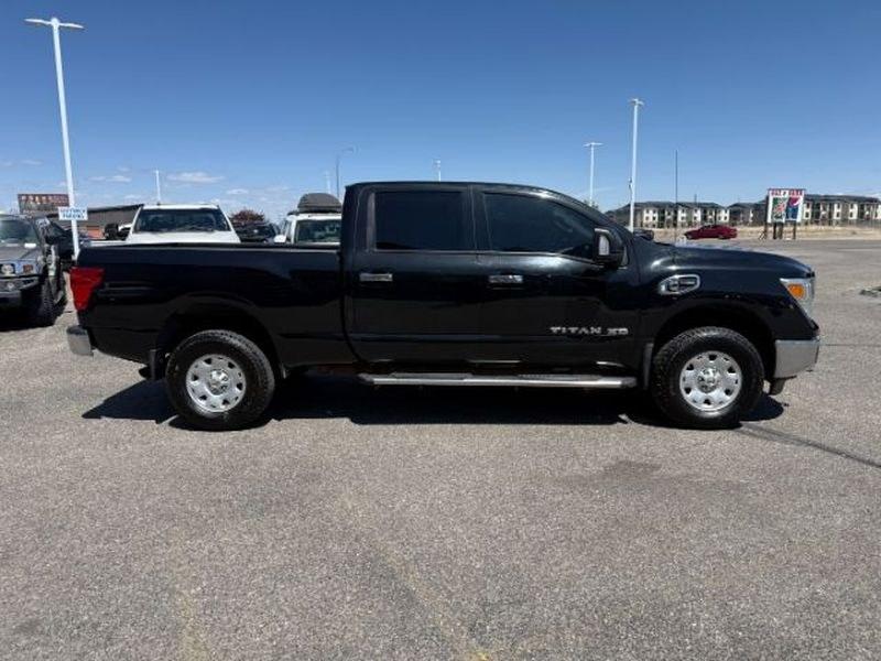 2016 Magnetic Black /Beige Nissan Titan XD SV (1N6BA1F32GN) with an V8, 5.0L engine, 6-speed automatic transmission, located at 1175 N Woodruff Ave, Idaho Falls, ID, 83401, 43.506901, -111.999657 - <b>Vehicle Details</b><br>Looking for a powerful pre-owned truck in Idaho Falls, ID? This 2016 Nissan Titan XD SV Diesel with 4WD delivers the strength, capability, and comfort truck shoppers want. Powered by a V8 5.0L Diesel engine, this Nissan Titan XD is built for towing, hauling, and confident d- Photo#6