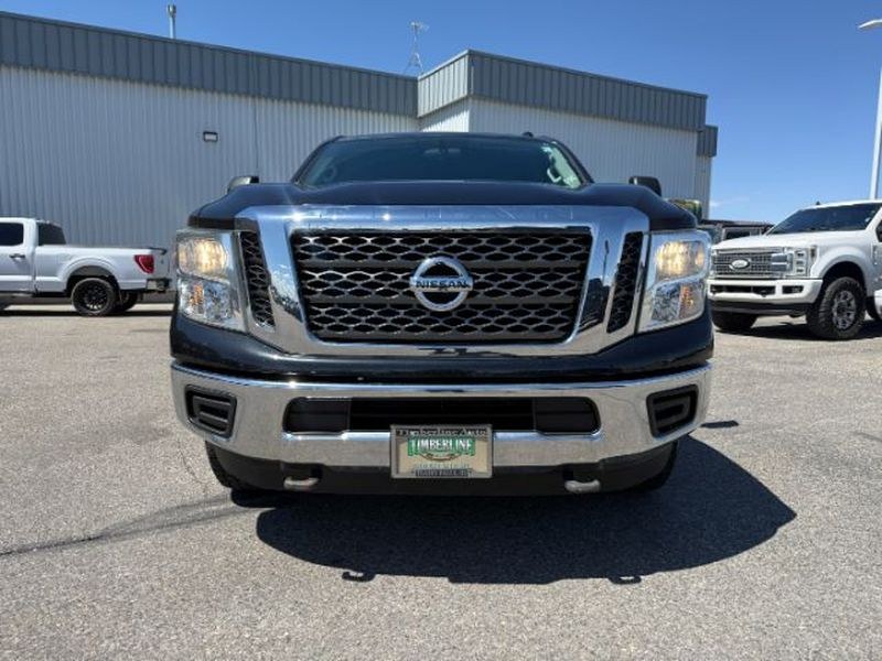 2016 Magnetic Black /Beige Nissan Titan XD SV (1N6BA1F32GN) with an V8, 5.0L engine, 6-speed automatic transmission, located at 1175 N Woodruff Ave, Idaho Falls, ID, 83401, 43.506901, -111.999657 - <b>Vehicle Details</b><br>Looking for a powerful pre-owned truck in Idaho Falls, ID? This 2016 Nissan Titan XD SV Diesel with 4WD delivers the strength, capability, and comfort truck shoppers want. Powered by a V8 5.0L Diesel engine, this Nissan Titan XD is built for towing, hauling, and confident d- Photo#8