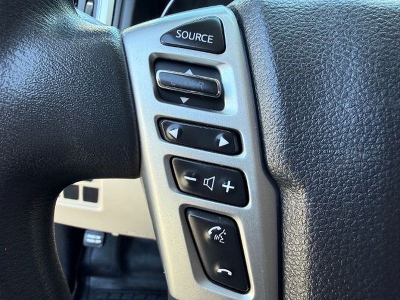 2016 Magnetic Black /Beige Nissan Titan XD SV (1N6BA1F32GN) with an V8, 5.0L engine, 6-speed automatic transmission, located at 1175 N Woodruff Ave, Idaho Falls, ID, 83401, 43.506901, -111.999657 - <b>Vehicle Details</b><br>Looking for a powerful pre-owned truck in Idaho Falls, ID? This 2016 Nissan Titan XD SV Diesel with 4WD delivers the strength, capability, and comfort truck shoppers want. Powered by a V8 5.0L Diesel engine, this Nissan Titan XD is built for towing, hauling, and confident d- Photo#20