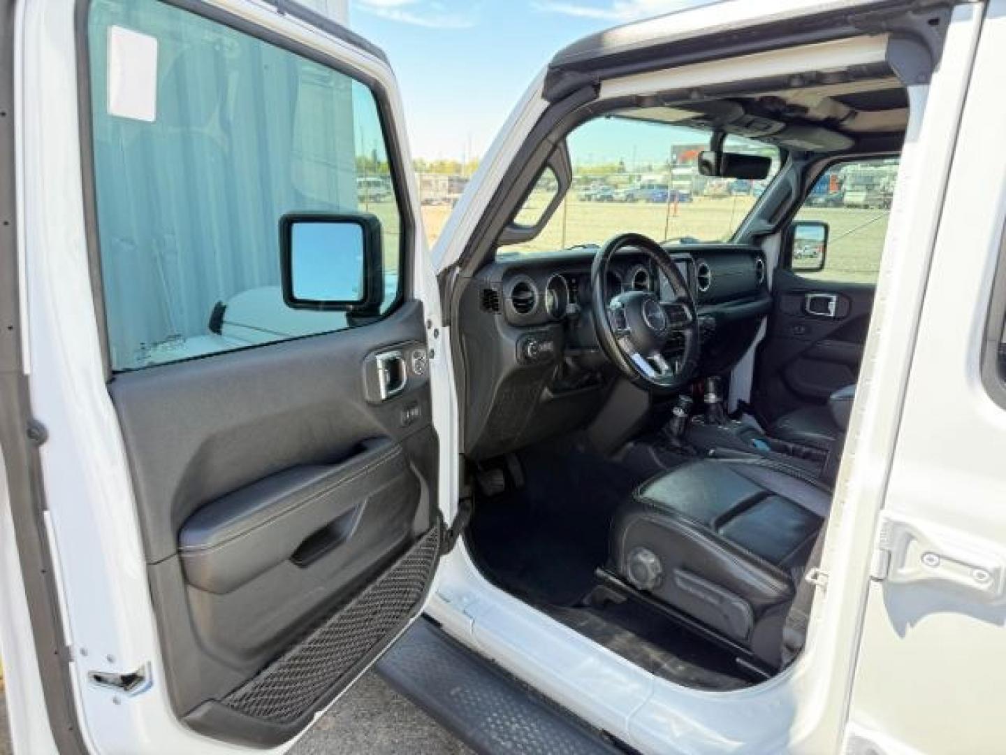 2022 WHITE /Black Jeep Gladiator (1C6HJTFG9NL) with an 36L V-6 DOHC engine, Automatic transmission, located at 1175 N Woodruff Ave, Idaho Falls, ID, 83401, 43.506901, -111.999657 - At Timberline Auto, finding a great deal on your next vehicle is always easy! Our experienced sales staff's goal is to help find you the right vehicle at the right price! Our knowledgeable finance department has options for almost any credit score. We offer extended service contract options to prote - Photo#40