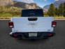 2022 WHITE /Black Jeep Gladiator (1C6HJTFG9NL) with an 36L V-6 DOHC engine, Automatic transmission, located at 1175 N Woodruff Ave, Idaho Falls, ID, 83401, 43.506901, -111.999657 - At Timberline Auto, finding a great deal on your next vehicle is always easy! Our experienced sales staff's goal is to help find you the right vehicle at the right price! Our knowledgeable finance department has options for almost any credit score. We offer extended service contract options to prote - Photo#3