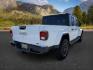 2022 WHITE /Black Jeep Gladiator (1C6HJTFG9NL) with an 36L V-6 DOHC engine, Automatic transmission, located at 1175 N Woodruff Ave, Idaho Falls, ID, 83401, 43.506901, -111.999657 - At Timberline Auto, finding a great deal on your next vehicle is always easy! Our experienced sales staff's goal is to help find you the right vehicle at the right price! Our knowledgeable finance department has options for almost any credit score. We offer extended service contract options to prote - Photo#6