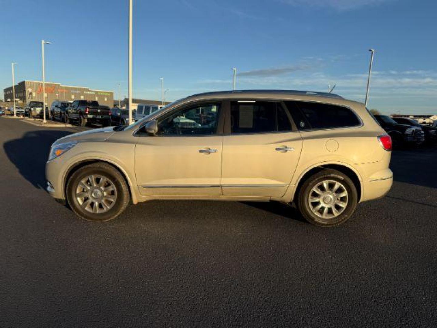 2014 GOLD /Ebony Buick Enclave Premium (5GAKVCKD8EJ) with an 3.6L V-6 gasoline direct injection engine, AUTOMATIC transmission, located at 1235 N Woodruff Ave., Idaho Falls, 83401, (208) 523-1053, 43.507172, -112.000488 - Photo#0