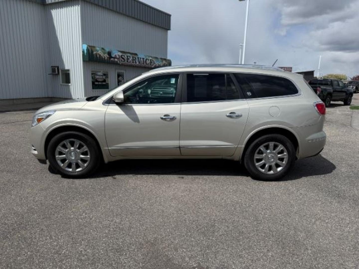 2014 GOLD /Ebony Buick Enclave (5GAKVCKD8EJ) with an 36L V-6 gasoline direct injection engine, Automatic transmission, located at 1175 N Woodruff Ave, Idaho Falls, ID, 83401, 43.506901, -111.999657 - At Timberline Auto, finding a great deal on your next vehicle is always easy! Our experienced sales staff's goal is to help find you the right vehicle at the right price! Our knowledgeable finance department has options for almost any credit score. We offer extended service contract options to prote - Photo#31