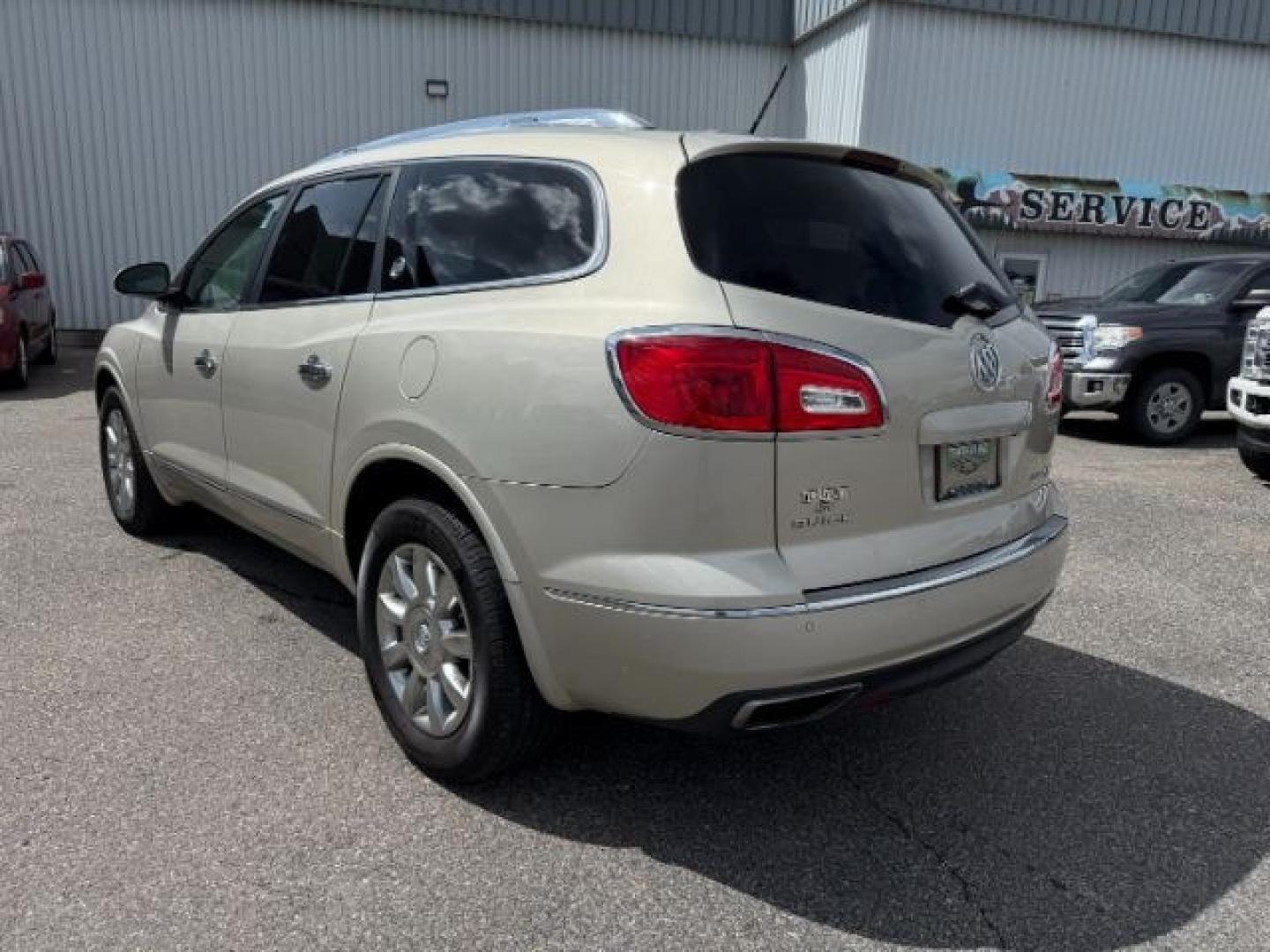 2014 GOLD /Ebony Buick Enclave (5GAKVCKD8EJ) with an 36L V-6 gasoline direct injection engine, Automatic transmission, located at 1175 N Woodruff Ave, Idaho Falls, ID, 83401, 43.506901, -111.999657 - At Timberline Auto, finding a great deal on your next vehicle is always easy! Our experienced sales staff's goal is to help find you the right vehicle at the right price! Our knowledgeable finance department has options for almost any credit score. We offer extended service contract options to prote - Photo#32