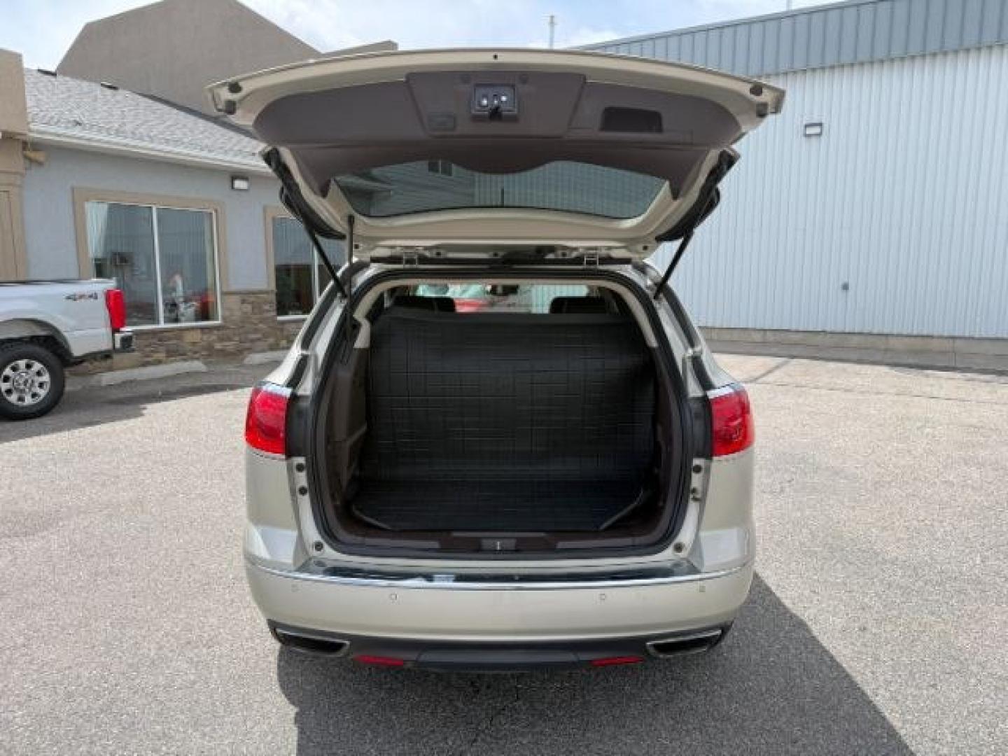 2014 GOLD /Ebony Buick Enclave (5GAKVCKD8EJ) with an 36L V-6 gasoline direct injection engine, Automatic transmission, located at 1175 N Woodruff Ave, Idaho Falls, ID, 83401, 43.506901, -111.999657 - At Timberline Auto, finding a great deal on your next vehicle is always easy! Our experienced sales staff's goal is to help find you the right vehicle at the right price! Our knowledgeable finance department has options for almost any credit score. We offer extended service contract options to prote - Photo#35