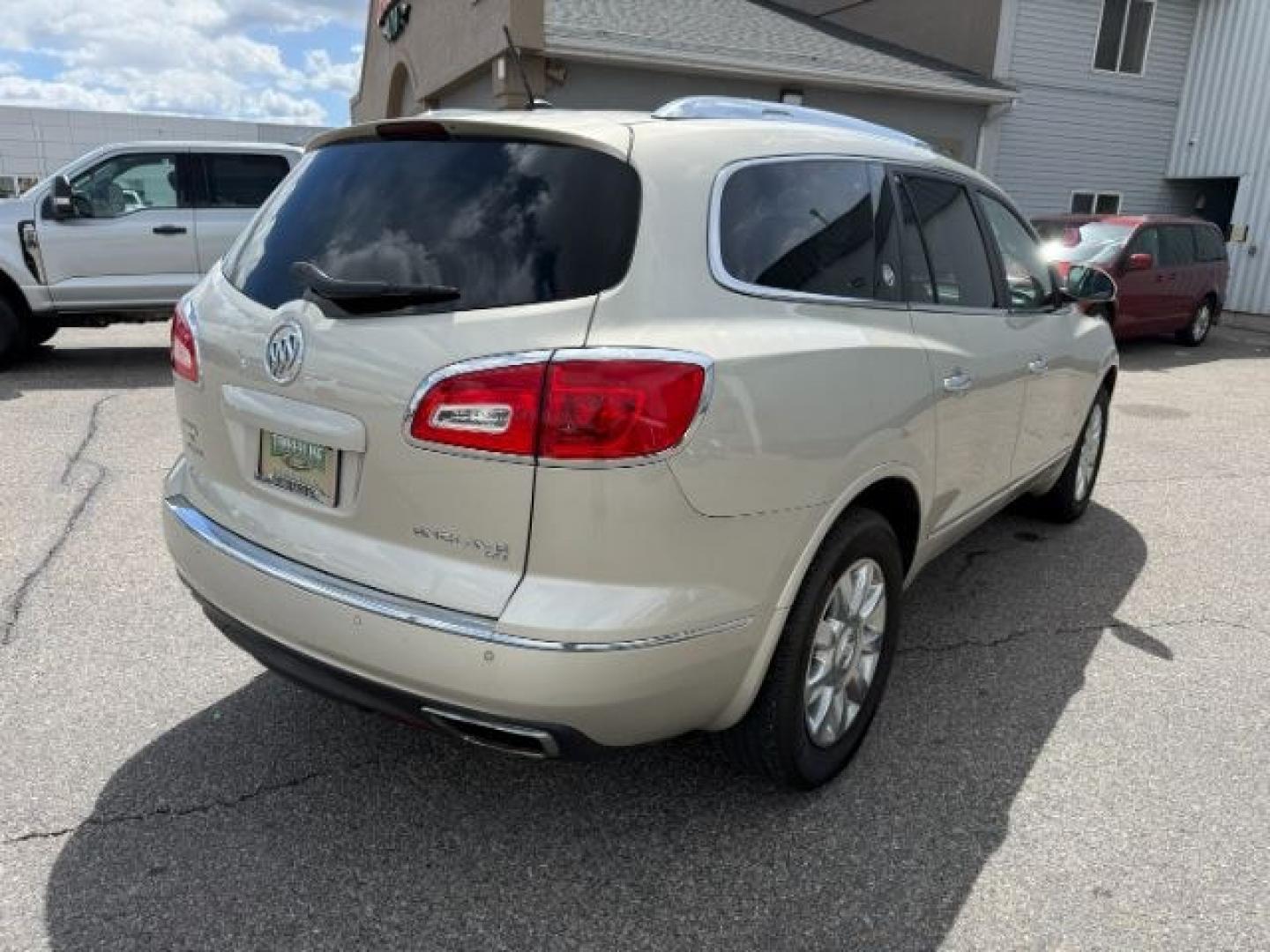 2014 GOLD /Ebony Buick Enclave (5GAKVCKD8EJ) with an 36L V-6 gasoline direct injection engine, Automatic transmission, located at 1175 N Woodruff Ave, Idaho Falls, ID, 83401, 43.506901, -111.999657 - At Timberline Auto, finding a great deal on your next vehicle is always easy! Our experienced sales staff's goal is to help find you the right vehicle at the right price! Our knowledgeable finance department has options for almost any credit score. We offer extended service contract options to prote - Photo#38
