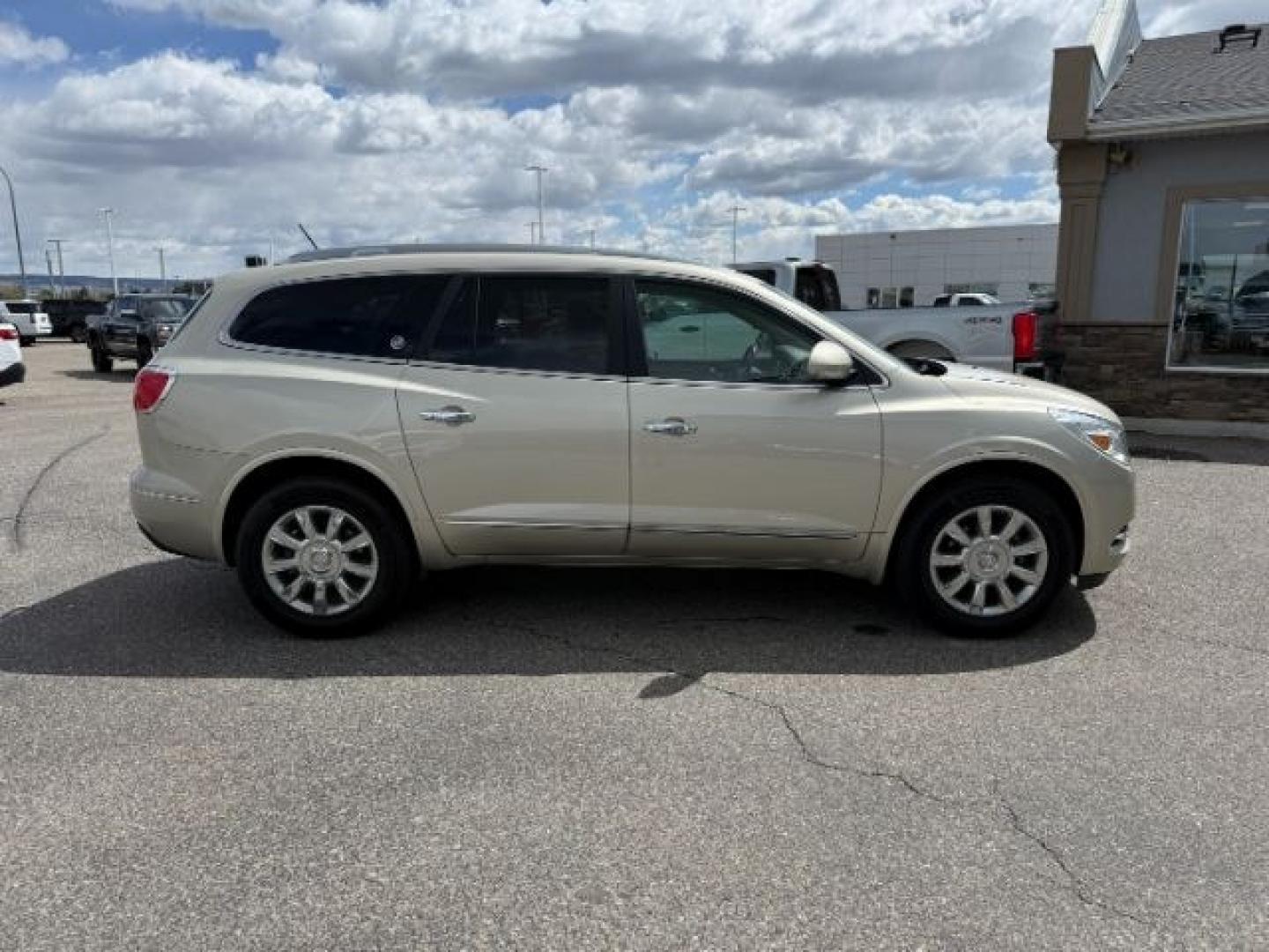 2014 GOLD /Ebony Buick Enclave (5GAKVCKD8EJ) with an 36L V-6 gasoline direct injection engine, Automatic transmission, located at 1175 N Woodruff Ave, Idaho Falls, ID, 83401, 43.506901, -111.999657 - At Timberline Auto, finding a great deal on your next vehicle is always easy! Our experienced sales staff's goal is to help find you the right vehicle at the right price! Our knowledgeable finance department has options for almost any credit score. We offer extended service contract options to prote - Photo#39