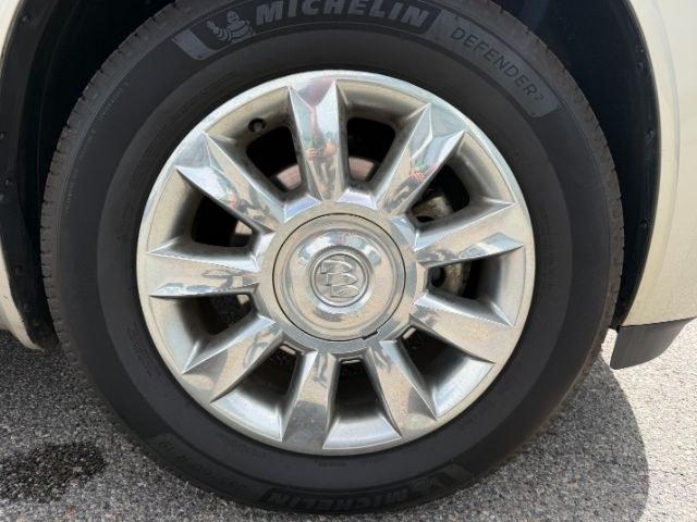 2014 GOLD /Ebony Buick Enclave Premium (5GAKVCKD8EJ) with an 3.6L V-6 gasoline direct injection engine, AUTOMATIC transmission, located at 1235 N Woodruff Ave., Idaho Falls, 83401, (208) 523-1053, 43.507172, -112.000488 - This 2014 Buick Enclave is a full-size SUV designed for comfortable family travel with spacious three-row seating and smooth road manners. Powered by a 3.6L V6 (VIN verified), it delivers balanced performance for daily driving, highway trips, and light towing needs. The ride is tuned for comfort, ma- Photo#43