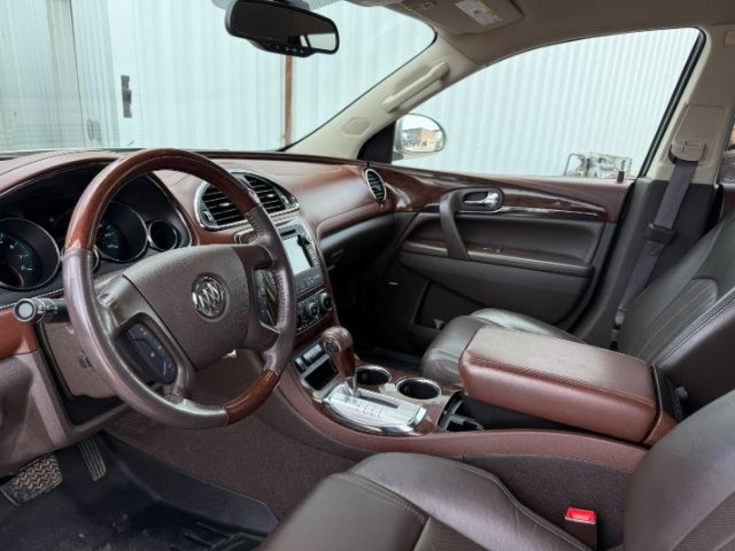 2014 GOLD /Ebony Buick Enclave (5GAKVCKD8EJ) with an 36L V-6 gasoline direct injection engine, Automatic transmission, located at 1175 N Woodruff Ave, Idaho Falls, ID, 83401, 43.506901, -111.999657 - At Timberline Auto, finding a great deal on your next vehicle is always easy! Our experienced sales staff's goal is to help find you the right vehicle at the right price! Our knowledgeable finance department has options for almost any credit score. We offer extended service contract options to prote - Photo#46