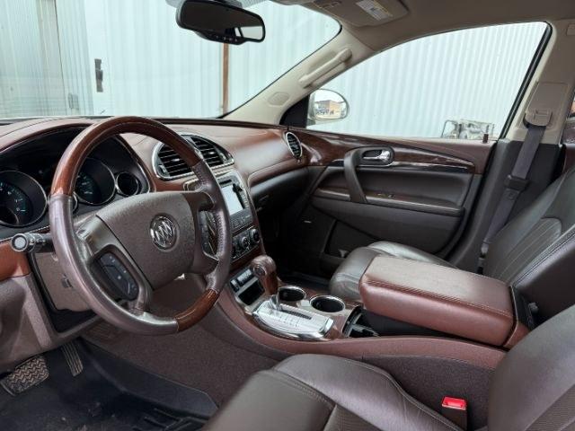 2014 GOLD /Ebony Buick Enclave Premium (5GAKVCKD8EJ) with an 3.6L V-6 gasoline direct injection engine, AUTOMATIC transmission, located at 1235 N Woodruff Ave., Idaho Falls, 83401, (208) 523-1053, 43.507172, -112.000488 - This 2014 Buick Enclave is a full-size SUV designed for comfortable family travel with spacious three-row seating and smooth road manners. Powered by a 3.6L V6 (VIN verified), it delivers balanced performance for daily driving, highway trips, and light towing needs. The ride is tuned for comfort, ma- Photo#46