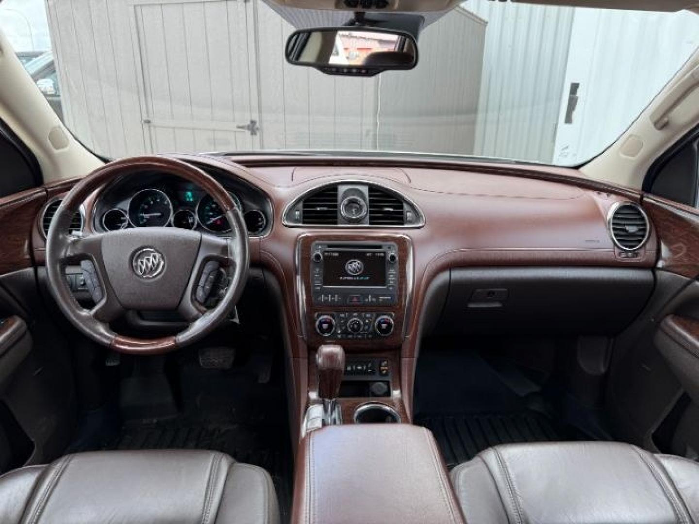 2014 GOLD /Ebony Buick Enclave (5GAKVCKD8EJ) with an 36L V-6 gasoline direct injection engine, Automatic transmission, located at 1175 N Woodruff Ave, Idaho Falls, ID, 83401, 43.506901, -111.999657 - At Timberline Auto, finding a great deal on your next vehicle is always easy! Our experienced sales staff's goal is to help find you the right vehicle at the right price! Our knowledgeable finance department has options for almost any credit score. We offer extended service contract options to prote - Photo#56