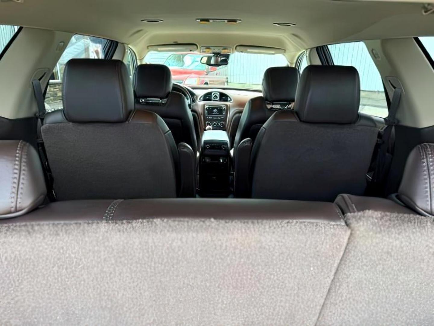 2014 GOLD /Ebony Buick Enclave (5GAKVCKD8EJ) with an 36L V-6 gasoline direct injection engine, Automatic transmission, located at 1175 N Woodruff Ave, Idaho Falls, ID, 83401, 43.506901, -111.999657 - At Timberline Auto, finding a great deal on your next vehicle is always easy! Our experienced sales staff's goal is to help find you the right vehicle at the right price! Our knowledgeable finance department has options for almost any credit score. We offer extended service contract options to prote - Photo#7