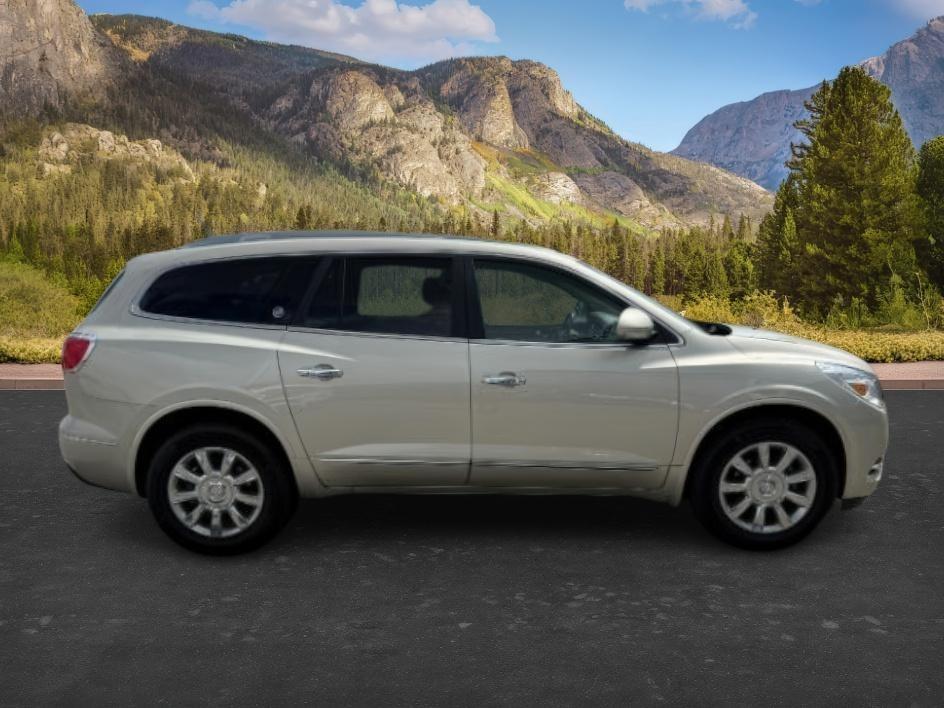 2014 GOLD /Ebony Buick Enclave Premium (5GAKVCKD8EJ) with an 3.6L V-6 gasoline direct injection engine, AUTOMATIC transmission, located at 1235 N Woodruff Ave., Idaho Falls, 83401, (208) 523-1053, 43.507172, -112.000488 - This 2014 Buick Enclave is a full-size SUV designed for comfortable family travel with spacious three-row seating and smooth road manners. Powered by a 3.6L V6 (VIN verified), it delivers balanced performance for daily driving, highway trips, and light towing needs. The ride is tuned for comfort, ma- Photo#9