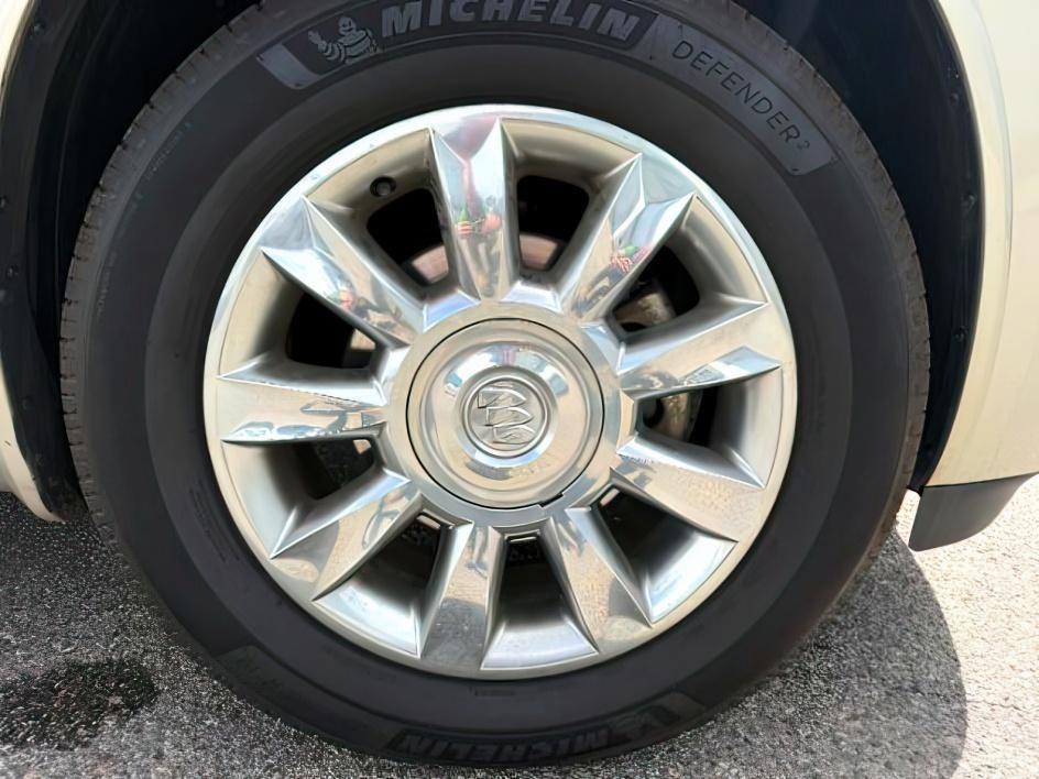 2014 GOLD /Ebony Buick Enclave Premium (5GAKVCKD8EJ) with an 3.6L V-6 gasoline direct injection engine, AUTOMATIC transmission, located at 1235 N Woodruff Ave., Idaho Falls, 83401, (208) 523-1053, 43.507172, -112.000488 - This 2014 Buick Enclave is a full-size SUV designed for comfortable family travel with spacious three-row seating and smooth road manners. Powered by a 3.6L V6 (VIN verified), it delivers balanced performance for daily driving, highway trips, and light towing needs. The ride is tuned for comfort, ma- Photo#13