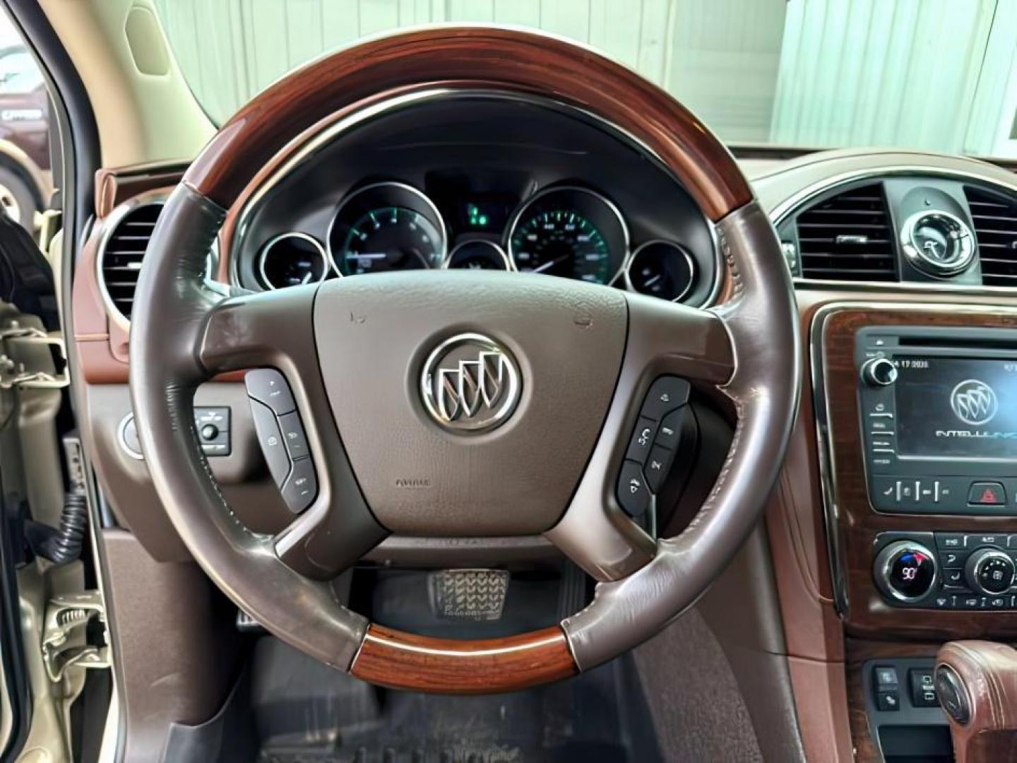 2014 GOLD /Ebony Buick Enclave (5GAKVCKD8EJ) with an 36L V-6 gasoline direct injection engine, Automatic transmission, located at 1175 N Woodruff Ave, Idaho Falls, ID, 83401, 43.506901, -111.999657 - At Timberline Auto, finding a great deal on your next vehicle is always easy! Our experienced sales staff's goal is to help find you the right vehicle at the right price! Our knowledgeable finance department has options for almost any credit score. We offer extended service contract options to prote - Photo#17