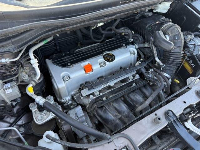 2012 GRAY /LEATHER Honda CR-V EX (5J6RM4H71CL) with an 2.4L I-4 port/direct injection engine, AUTOMATIC transmission, located at 1235 N Woodruff Ave., Idaho Falls, 83401, (208) 523-1053, 43.507172, -112.000488 - At Timberline Auto, finding a great deal on your next vehicle is always easy! Our experienced sales staff's goal is to help find you the right vehicle at the right price! Our knowledgeable finance department has options for almost any credit score. We offer extended service contract options to prote- Photo#53