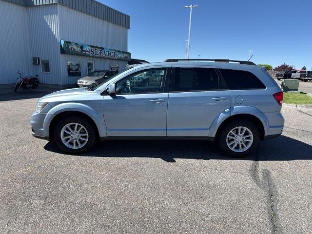 2013 BLUE /Black/Light Frost Dodge Journey (3C4PDCBB4DT) with an 24L I-4 DOHC engine, Automatic transmission, located at 1175 N Woodruff Ave, Idaho Falls, ID, 83401, 43.506901, -111.999657 - This 2013 Dodge Journey is a versatile midsize crossover built to handle the demands of daily driving, family errands, and weekend travel. Powered by a 2.4L I4 engine, it offers practical efficiency and dependable performance for commuting and highway trips. The interior provides comfortable seating - Photo#26