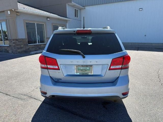 2013 BLUE /Black/Light Frost Dodge Journey (3C4PDCBB4DT) with an 24L I-4 DOHC engine, Automatic transmission, located at 1175 N Woodruff Ave, Idaho Falls, ID, 83401, 43.506901, -111.999657 - This 2013 Dodge Journey is a versatile midsize crossover built to handle the demands of daily driving, family errands, and weekend travel. Powered by a 2.4L I4 engine, it offers practical efficiency and dependable performance for commuting and highway trips. The interior provides comfortable seating - Photo#28