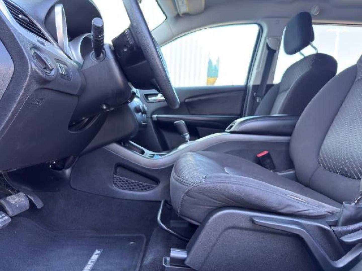 2013 BLUE /Black/Light Frost Dodge Journey (3C4PDCBB4DT) with an 24L I-4 DOHC engine, Automatic transmission, located at 1175 N Woodruff Ave, Idaho Falls, ID, 83401, 43.506901, -111.999657 - This 2013 Dodge Journey is a versatile midsize crossover built to handle the demands of daily driving, family errands, and weekend travel. Powered by a 2.4L I4 engine, it offers practical efficiency and dependable performance for commuting and highway trips. The interior provides comfortable seating- Photo#13