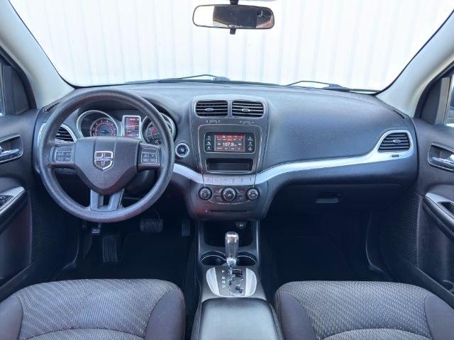 2013 BLUE /Black/Light Frost Dodge Journey (3C4PDCBB4DT) with an 24L I-4 DOHC engine, Automatic transmission, located at 1175 N Woodruff Ave, Idaho Falls, ID, 83401, 43.506901, -111.999657 - This 2013 Dodge Journey is a versatile midsize crossover built to handle the demands of daily driving, family errands, and weekend travel. Powered by a 2.4L I4 engine, it offers practical efficiency and dependable performance for commuting and highway trips. The interior provides comfortable seating - Photo#47