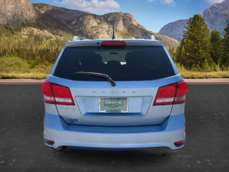 2013 BLUE /Black/Light Frost Dodge Journey (3C4PDCBB4DT) with an 24L I-4 DOHC engine, Automatic transmission, located at 1175 N Woodruff Ave, Idaho Falls, ID, 83401, 43.506901, -111.999657 - This 2013 Dodge Journey is a versatile midsize crossover built to handle the demands of daily driving, family errands, and weekend travel. Powered by a 2.4L I4 engine, it offers practical efficiency and dependable performance for commuting and highway trips. The interior provides comfortable seating - Photo#3