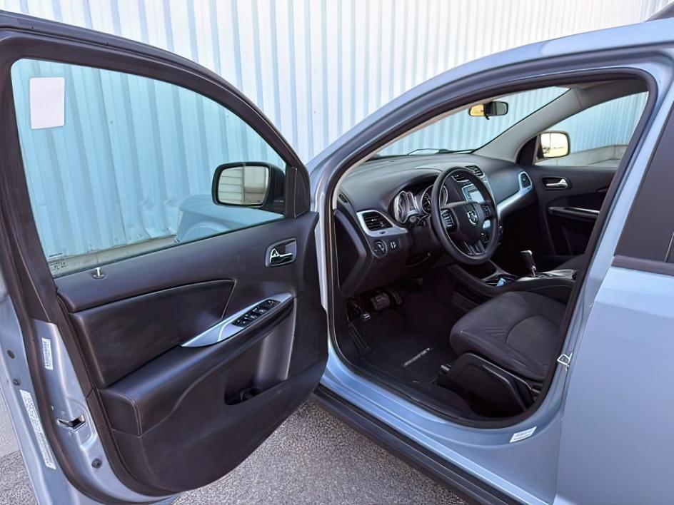 2013 BLUE /Black/Light Frost Dodge Journey (3C4PDCBB4DT) with an 24L I-4 DOHC engine, Automatic transmission, located at 1175 N Woodruff Ave, Idaho Falls, ID, 83401, 43.506901, -111.999657 - This 2013 Dodge Journey is a versatile midsize crossover built to handle the demands of daily driving, family errands, and weekend travel. Powered by a 2.4L I4 engine, it offers practical efficiency and dependable performance for commuting and highway trips. The interior provides comfortable seating - Photo#12